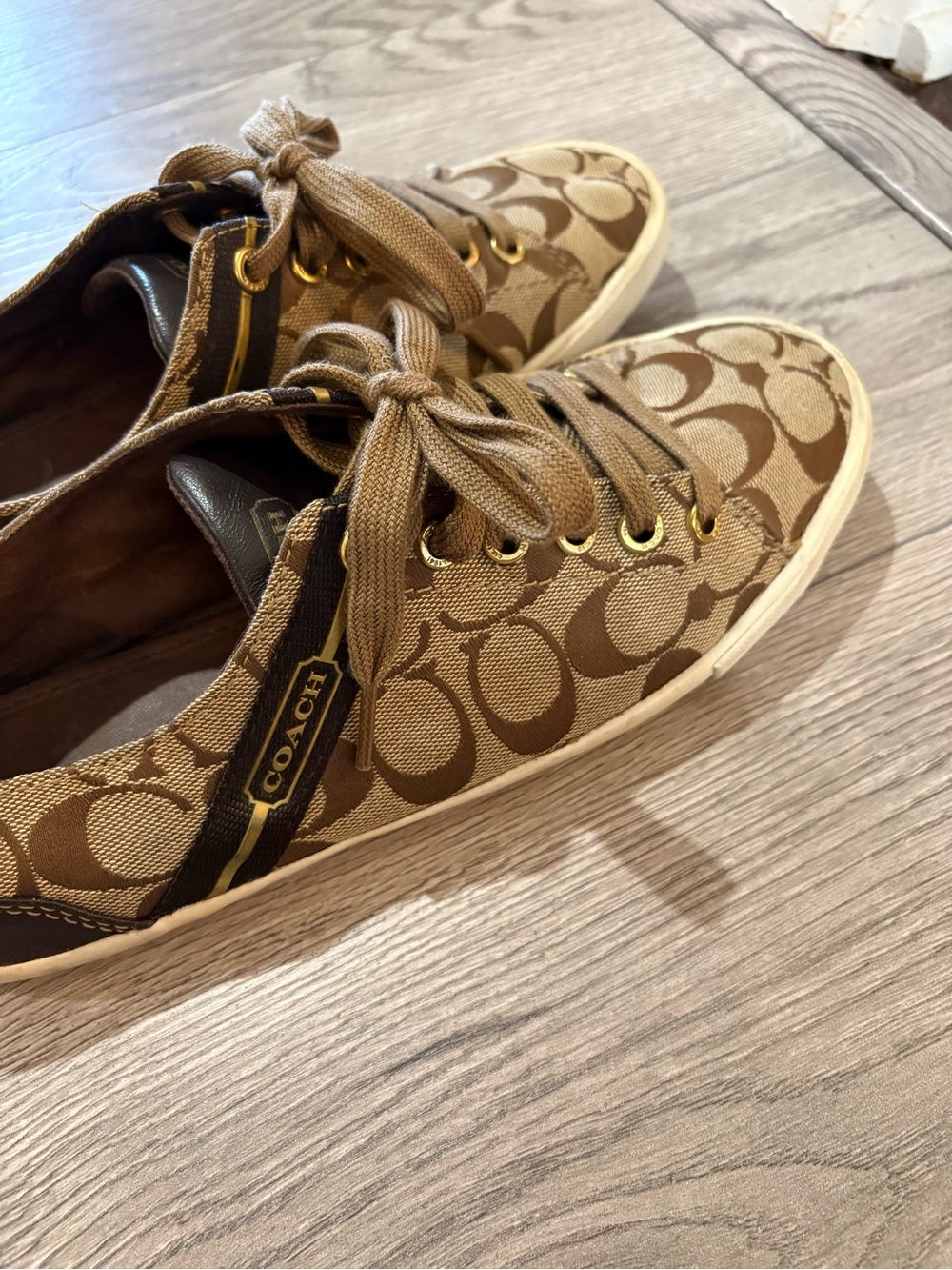 Coach women Signature Canvas Sneakers in Brown and Cream